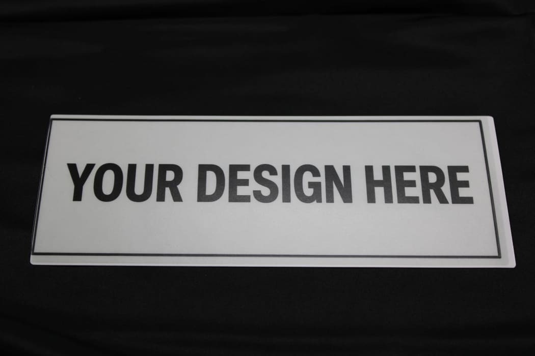 Voorbeeldfoto van een bumpersticker, 18x7 cm